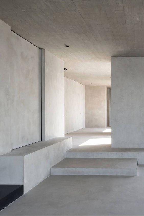 Concrete corridor with bench seating